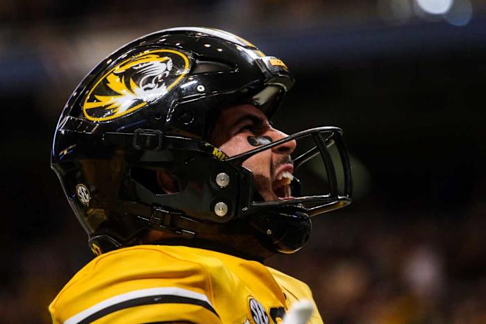 Missouri's Cody Schrader exclaims in celebration.